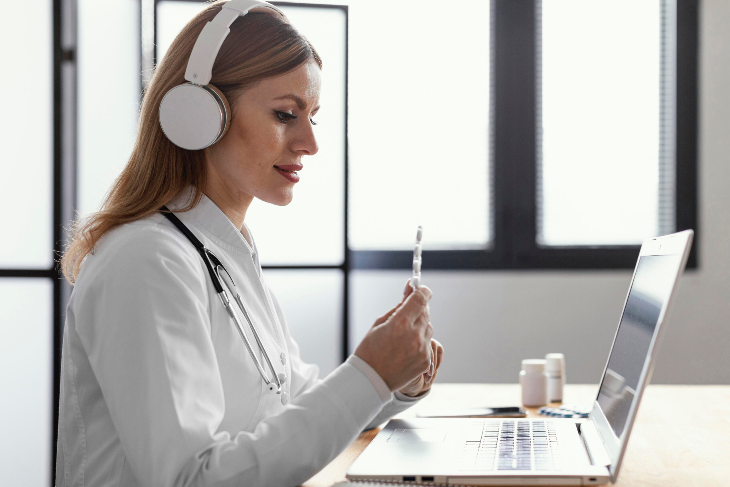 medium shot doctor talking patient scaled