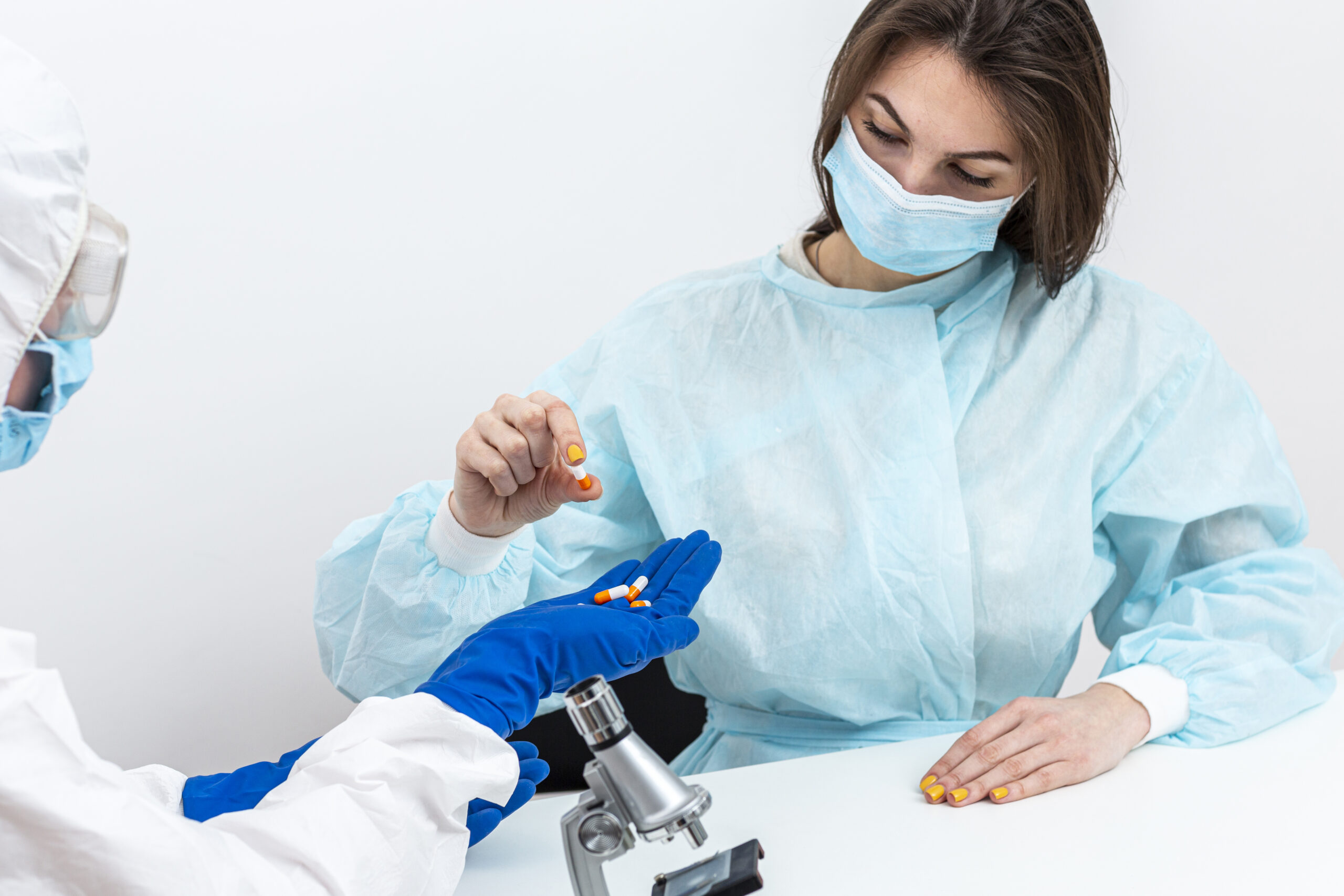 person hazmat suit with pacient