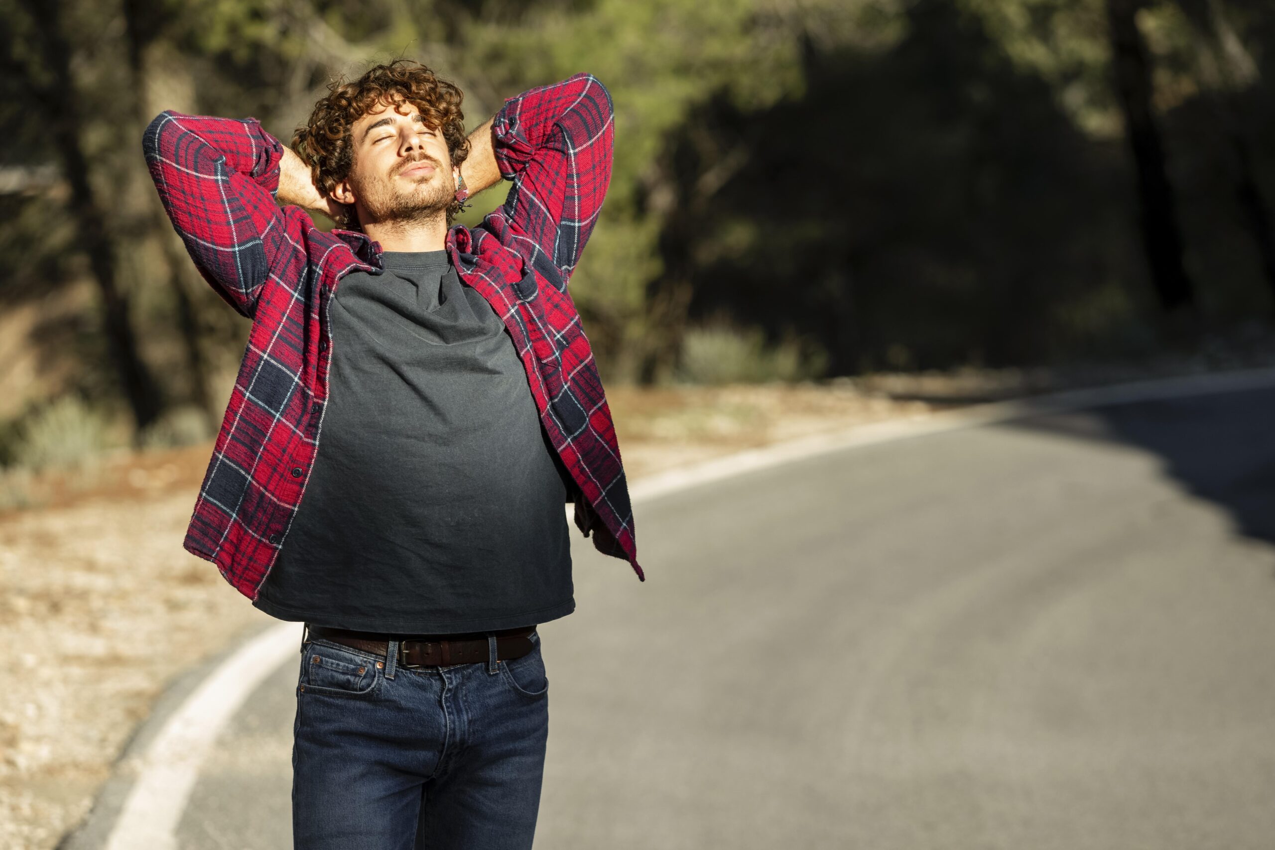 front view happy man enjoying nature while road trip with copy space